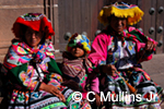 Two Quechua women and child in Cuzco, Peru